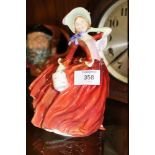 A ROYAL DOULTON AUTUMN BREEZES FIGURE HN1934