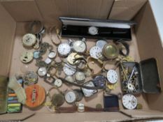 A BOX OF WRIST AND POCKET WATCH PARTS TO INCLUDE A LADIES OMEGA DE VILLE WRIST WATCH A/F