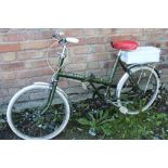 A VINTAGE RALEIGH R-20 FOLDER STOW AWAY BICYCLE PLUS ACCESSORIES