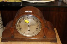 AN ART DECO OAK MANTEL CLOCK