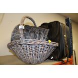 TWO SMALL WICKER BASKETS TOGETHER WITH A MODERN LEATHERETTE SUITCASE