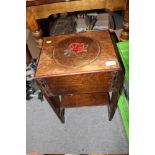 AN OAK SEWING BOX ON LEGS AND CONTENTS