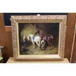 A GILT FRAMED OIL ON CANVAS DEPICTING A STABLE INTERIOR SCENE WITH FIGURES AND HORSES SIGNED CAMBELL