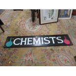 A VINTAGE 'CHEMISTS' GLAZED RECTANGULAR ADVERTISING SIGN 32 X 156 cm