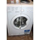 AN INDESIT WASHING MACHINE