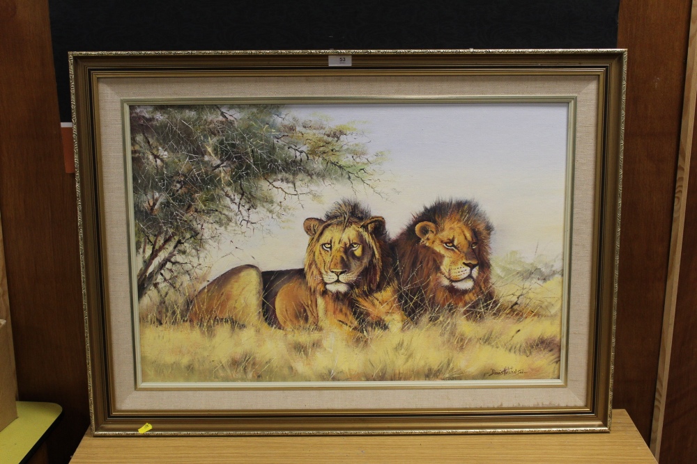 A LARGE GILT FRAMED OIL ON BOARD DEPICTING LIONS RESTING BESIDE A TREE BY DENNIS HUTCHINSON