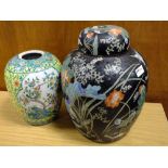 A VERY LARGE ORIENTAL GINGER JAR DECORATED WITH BIRDS AND FLOWERS ON BLACK GROUND TOGETHER WITH A