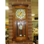 AN EARLY 20TH CENTURY OAK GLAZED WALL CLOCK, H 78 cm