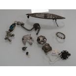 A BAG OF SILVER AND WHITE METAL BROOCHES, FILIGREE MODEL BOAT ETC.
