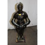 A LARGE KNIGHT SHAPED COMPANION SET, H 66 CM