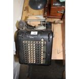 A VINTAGE CORONA ADDING MACHINE