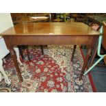 A 19TH CENTURY MAHOGANY SIDE TABLE RAISED ON TURNED LEGS, H 72 cm, W 95 cm