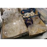 TWO TRAYS OF MOSTLY CUT GLASS TO INCLUDE DECANTERS, CUT GLASS BISCUIT BARREL ETC.