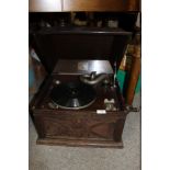 A VINTAGE OAK CASED H.M.V. WIND UP GRAMOPHONE