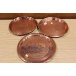 A VINTAGE COPPER JOHNNY WALKER WHISKEY TRAY TOGETHER WITH TWO ANSELLS EXAMPLES (3)