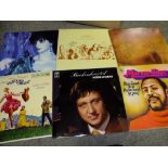 A SMALL BOX OF LP RECORDS AND 7" SINGLES TO INCLUDE THE MOODY BLUES, MARVIN GAYE, ETC.