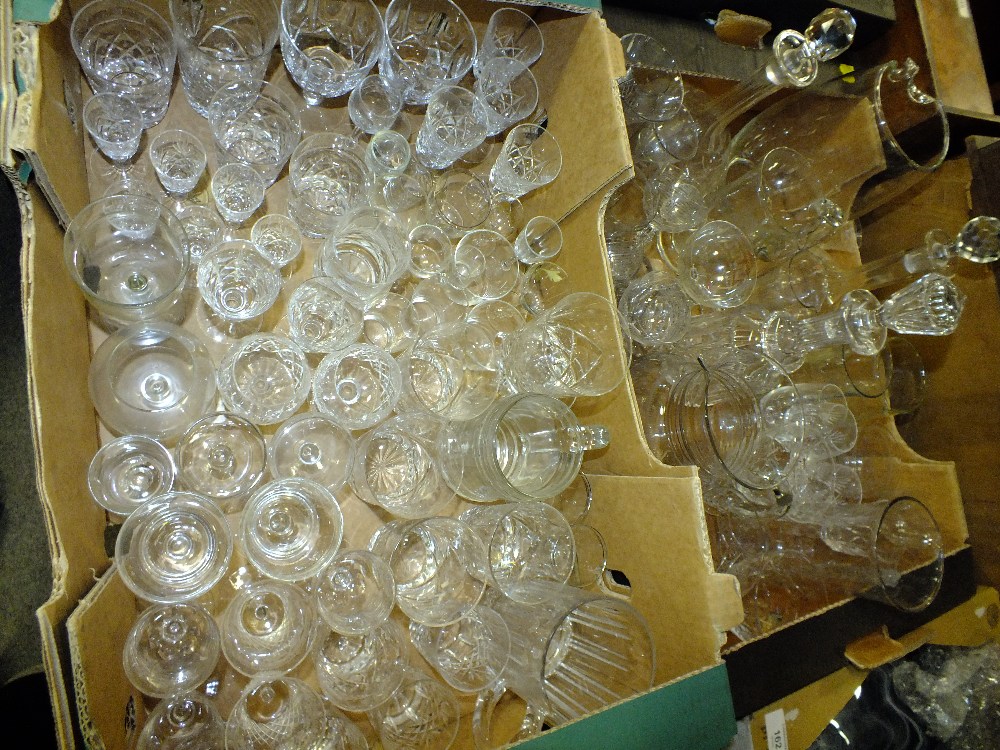 TWO TRAYS OF CUT GLASS TO INCLUDE DECANTERS AND DRINKING GLASSES