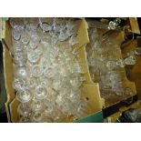 TWO TRAYS OF CUT GLASS TO INCLUDE DECANTERS AND DRINKING GLASSES