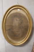 AN ANTIQUE PENCIL PORTRAIT STUDY OF A LADY HOLDING AND POINTING TO A SCROLL IN GILT OVAL FRAME