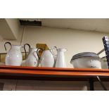 St Mary's Abbey - A QUANTITY OF VINTAGE ENAMEL BLUE AND WHITE JUGS AND BOWLS OF ASSORTED SIZES