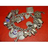 A SILVER CHARM BRACELET, APPROX WEIGHT 108.8 G