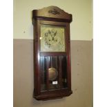 AN EDWARDIAN OAK GLAZED WALL CLOCK, H 78 cm