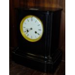 AN ANTIQUE SLATE MANTEL CLOCK