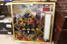 AN ILLUMINATING WALL HANGING THE LORD OF THE RINGS FRUIT MACHINE GAME DISPLAY OVERALL SIZE - 66CM