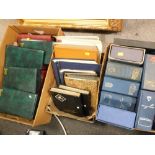 A COLLECTION OF WORLD STAMP ALBUMS AND CONTENTS TOGETHER WITH TWO BOXES OF EMPTY FIRST DAY COVER AL