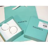 A PAIR OF TIFFANY STYLE EARRINGS AND BOX AND BAG