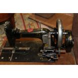 A CASED VINTAGE FRISTER & ROSSMANN SEWING MACHINE - CASE BROKEN