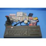 A SINCLAIR ZX SPECTRUM +2 WITH WIRES AND ACCESSORIES, together with a quantity of assorted games and