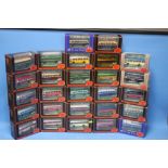 TWENTY SEVEN BOXED EXCLUSIVE FIRST EDITIONS DIE CAST BUSES AND COACHES, 1: 76 SCALE.