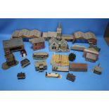 A LARGE TUB OF 00 GAUGE BUILDINGS, to include sheds, church etc. level crossing, trees etc.,