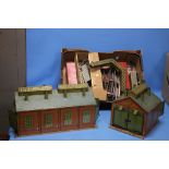 A PAIR OF VINTAGE HORNBY 'O' GAUGE TINPLATE ENGINE SHEDS, (large 46 cm long, small 23 cm long),