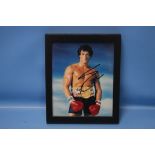 SYLVESTER STALLONE SIGNED PHOTOGRAPH, comes with typed letter which says it was signed at the London