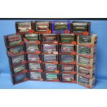 TWENTY NINE BOXED EXCLUSIVE FIRST EDITIONS DIE CAST BUSES AND COACHES, 1: 76 SCALE.