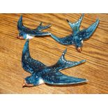 A SET OF THREE BESWICK WALL HANGING SWIFTS