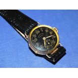 A RARE 18K GOLD GENTS WRISTWATCH MARKED ON THE BLACK ENAMEL DIAL 'CHRONOMETRE EBERHARD