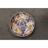 AN ORIENTAL IMARI STYLE CABINET PLATE DECORATED WITH HORSES, WITH SIX FIGURE CHARACTER MARK TO BASE,