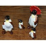 A SET OF FOUR BESWICK PENGUINS