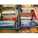 TWO TRAYS OF ASSORTED BOOKS TOGETHER WITH A LEATHER CASED PAIR OF LAWN BOWLS