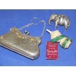 AN ANTIQUE PIN CUSHION, TAPE MEASURE, PURSE, NEEDLE CASE AND AN ELEPHANT PIN CUSHION