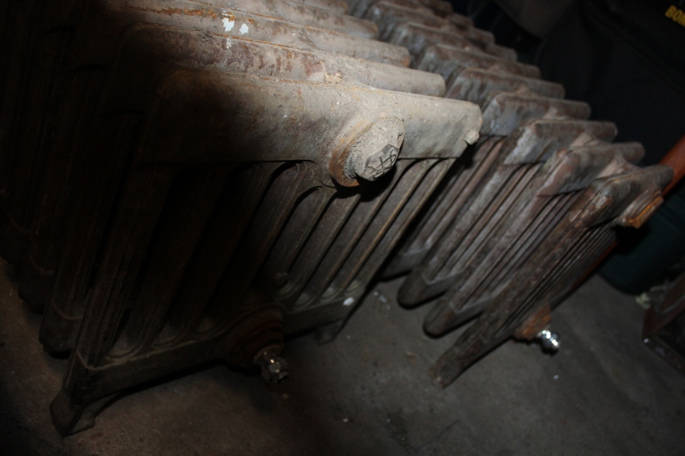 TWO EDWARDIAN FREE STANDING CAST IRON SHAPED / BAY WINDOW RADIATORS - Image 2 of 3