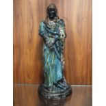 A VINTAGE CERAMIC FIGURE OF AN EGYPTIAN STYLE MAN, SIGNED A.B. HEATON TO BASE, H 36 CM, CHIP TO BASE