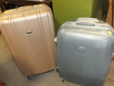 TWO MODERN SUITCASES