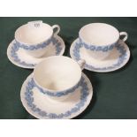 THREE WEDGWOOD QUEENSWARE CUPS AND SAUCERS