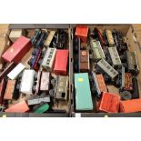 TWO TRAYS OF HORNBY 0 GAUGE TRAINS AND CARRIAGES