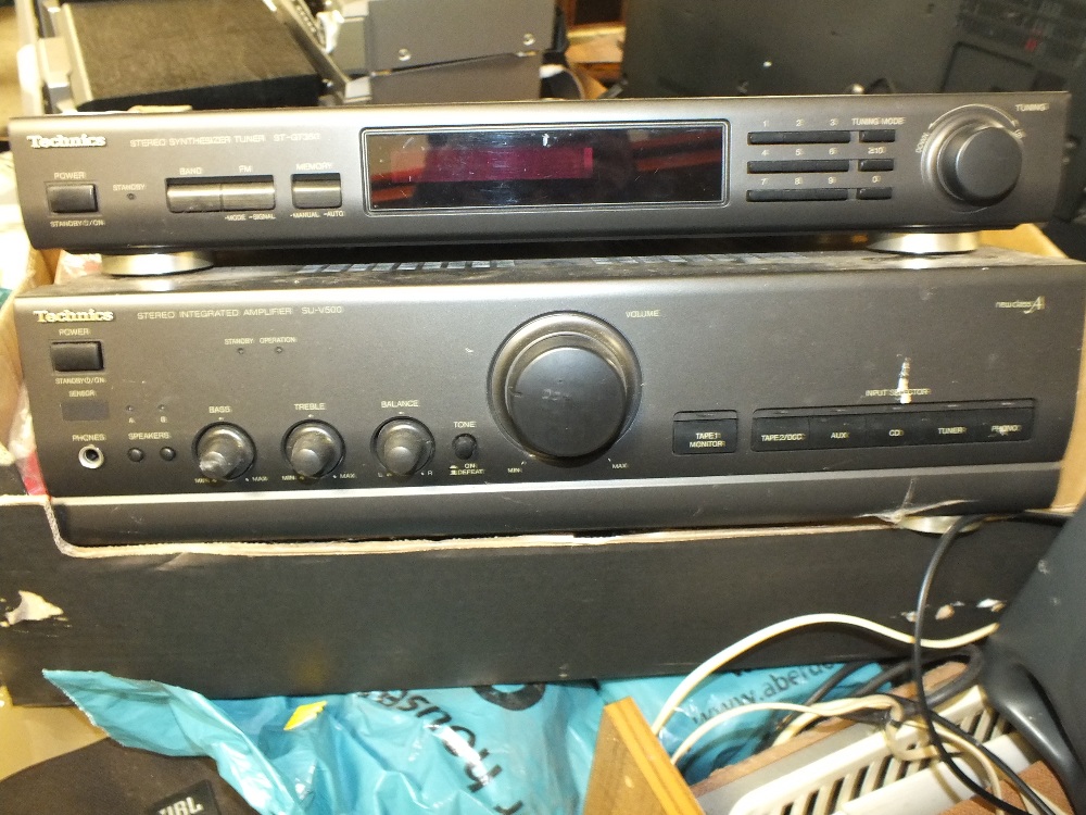 A TECHNICS STACKING STEREO SYSTEM TOGETHER WITH A PAIR OF JBL SPEAKERS AND STANDS