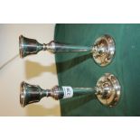 A PAIR OF HALLMARKED SILVER FILLED CANDLESTICKS HEIGHT - 21.5CM